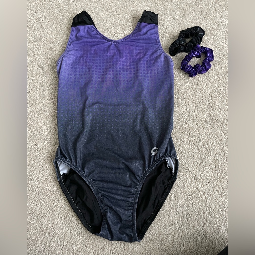 Gently used GK leotard in size adult medium, black and purple scrunchie